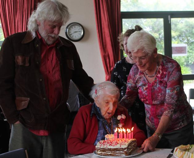 Isabelle Burgess-Matthews celebrates her 104th birthday surrounded by her friends and family, including  son Ian Burgess and  daughter Dorothy Fleming. Photo: Luisa Girao