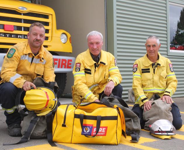 Rural Southland firefighters (from left) Nigel Milne, Ken Keenan and Graeme Appleby have everything ready to go to Australia to help fight the bushfires. Photo: Luisa Girao