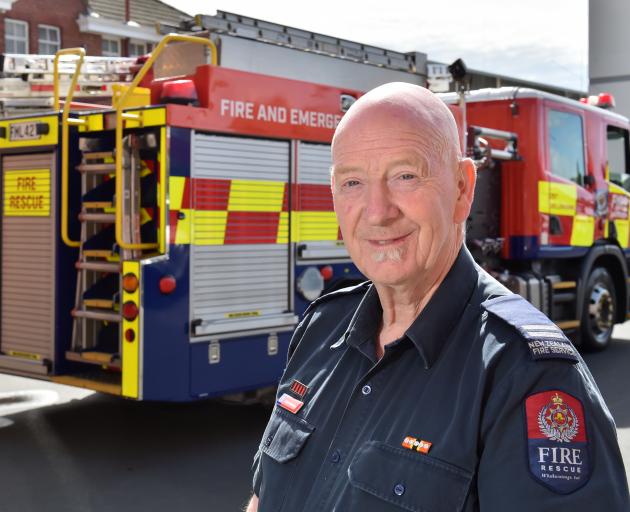 Dunedin City Fire Station Senior Firefighter Bevan Moreton celebrated his 50th year as a career...