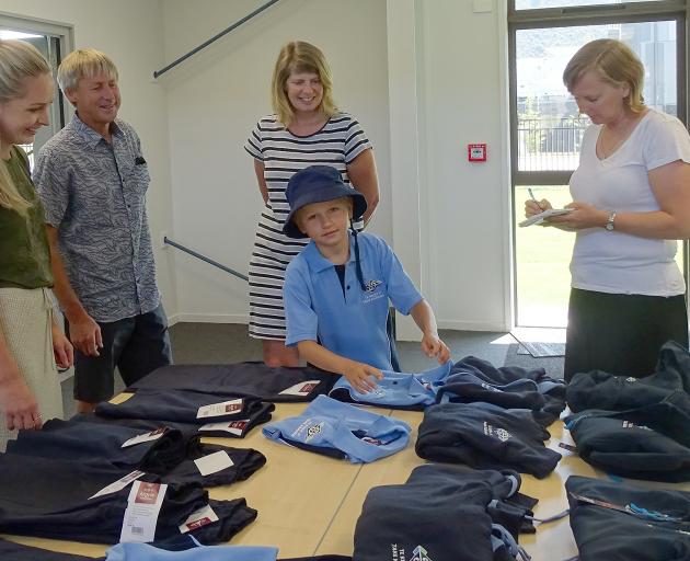 One of the first pupils at Te Kura O Take Karara to buy his new school uniform was Jack Jones (7)...