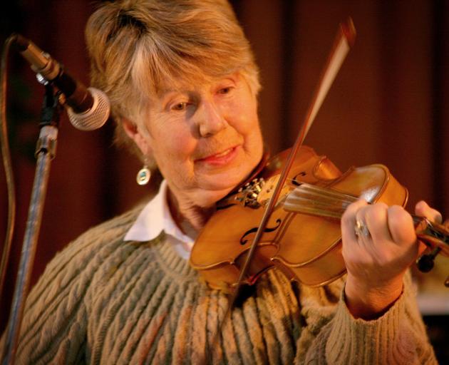 Noelene Tait, of Queenstown, pictured playing the violin in 2011. Mrs Tait was killed in a car...