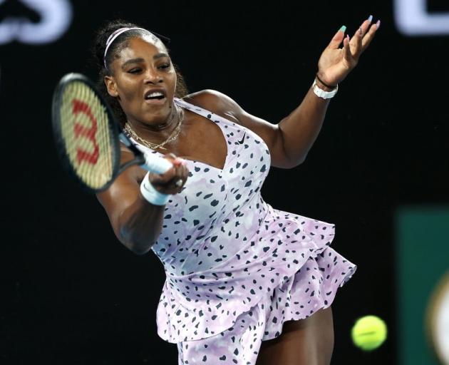 Serena Williams plays a shot during her Australian Open match yesterday. Photo: Getty Images