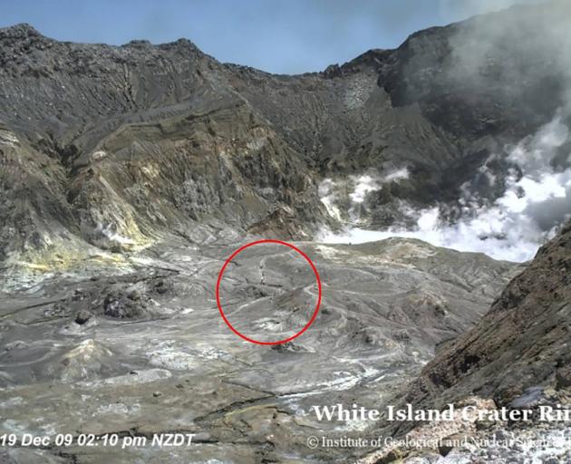 People can be seen inside the crater just before the eruption. Photo: GeoNet