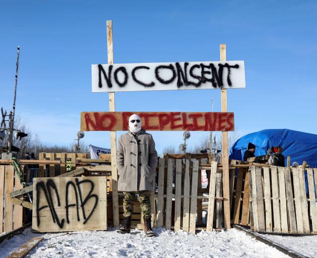 Supporters of the indigenous Wet'suwet'en Nation's hereditary chiefs camp at the railway blockade...