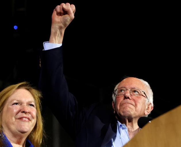 Democratic US presidential candidate Senator Bernie Sanders and this wife Jane take the stage at...