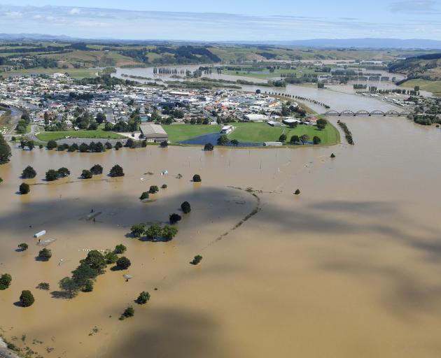 Flood banks and overflow areas hold back the worst of the deluge from Balclutha  yesterday, in...