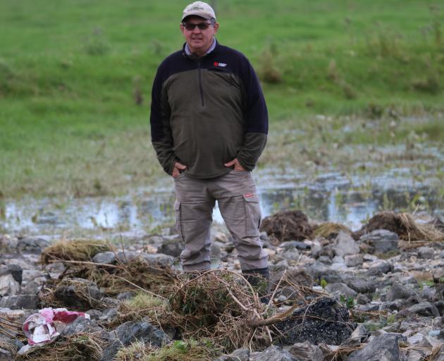 The cleanup continues for residents in the South affected by last week’s flooding. Some, like Wendon farmer Murray Shallard, reckon it was probably the worst seen since the 1980s. Photo: Sandy Eggleston