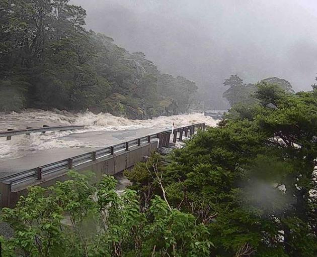Milford Road is closed today and in flood. Photo: Milford Road Alliance