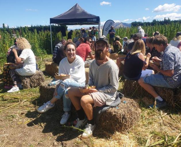 Liam O'Brien (centre) was among those who visited a Culverden hemp farm in the weekend to learn...