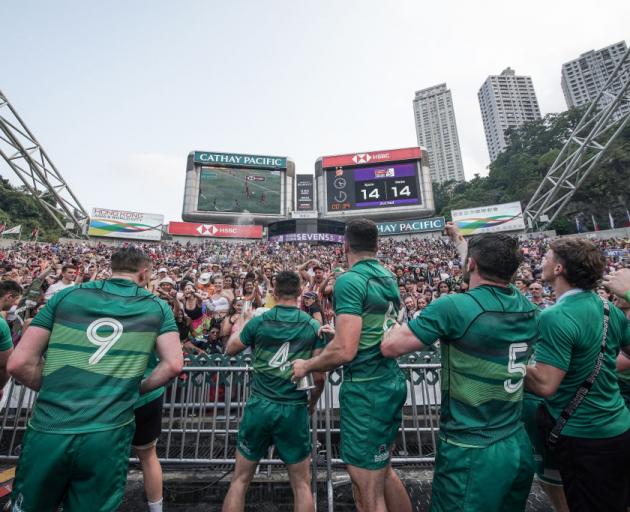 Ireland celebrates with fans after winning qualifier champion on day three of the Cathay Pacific/HSBC Hong Kong Sevens last year. Photo: Getty Images