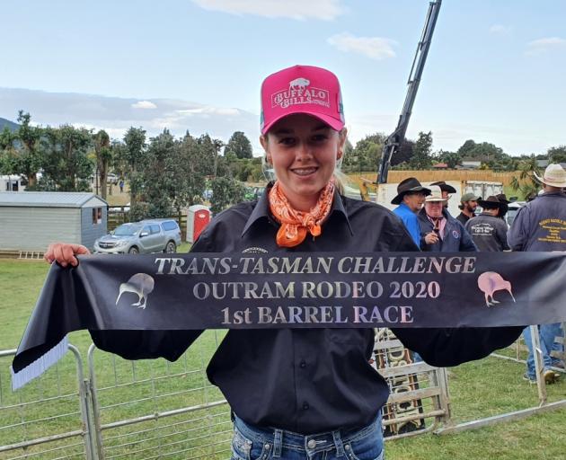 Caitlyn Hey with the sash she won in the second New Zealand round of barrel racing in the NZ...