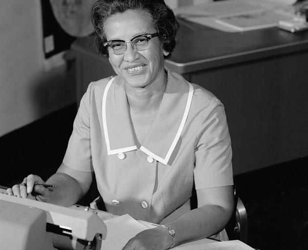 Nasa space scientist, and mathematician Katherine Johnson poses for a portrait at work at NASA Langley Research Center in 1966. Photo: Nasa via Getty Images