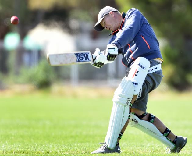 Matt Sutton, of Eastenders, powers into the ball against the Innswingers at a Masters Games match...