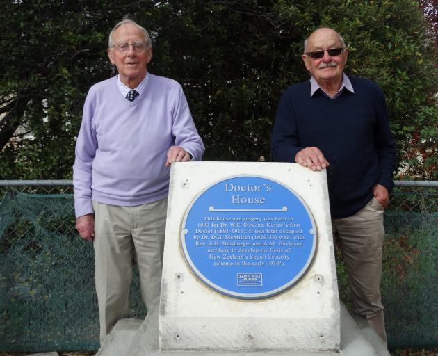 Dr Graeme Kerr (left) and Gavin Kerr stand beside a plaque dedicated to their grandfather, Dr...