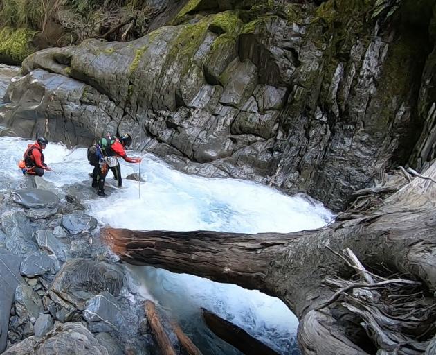 Wanaka Search and Rescue Swift Water and Canyon team probes Pyke Creek.
