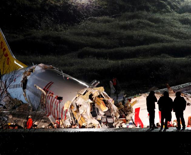 Pegasus Airlines plane overruns runway and crashes at Istanbul's Sabiha Gokcen airport. Photo: Reuters