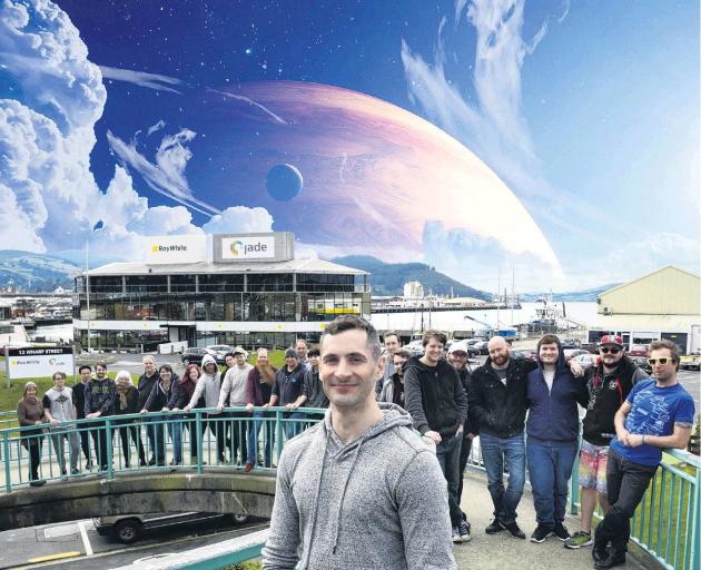 RocketWerkz founder Dean Hall and some of his team outside of their Dunedin HQ. IMAGE: GERARD O...