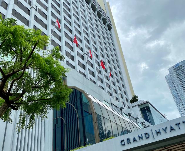 Management at the hotel - the Grand Hyatt Singapore - said they had cleaned extensively and were monitoring staff and guests for infection. Photo: Reuters Management at the hotel - the Grand Hyatt Singapore - said they had cleaned extensively and were monitoring staff and guests for infection. Photo: Reuters