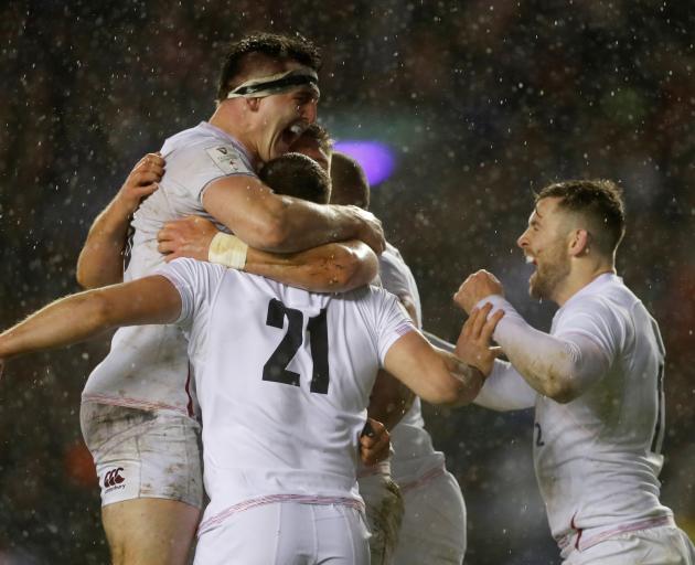 England's Ellis Genge celebrates scoring their first try with teammates. Photo: Reuters