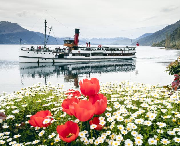 TSS Earnslaw cruises in front of the four-star Walter Peak garden. Photos: Supplied