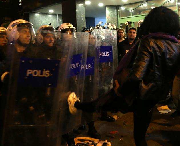 Police prevent women from marching in central Istanbul on Sunday. Photo: Reuters 
