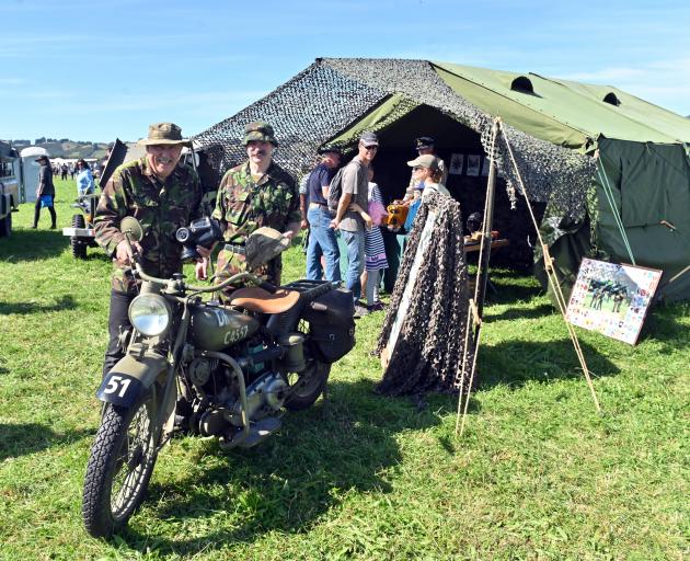 Having a look at a member’s Indian Motorcycle are New Zealand Military Vehicle Club HQ 44 South...