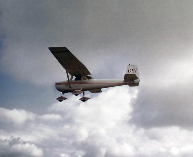 The Cessna 150 ZK-CGI, piloted by new owner Steven Elliott, in flight in 1985. PHOTOS: SUPPLIED