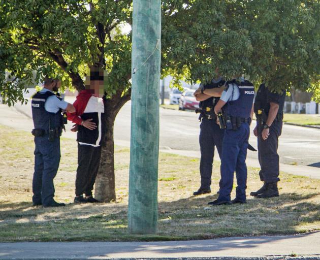 A man with a knife was arrested on the corner of Briggs Rd and Akaroa St. Photo: Geoff Sloan