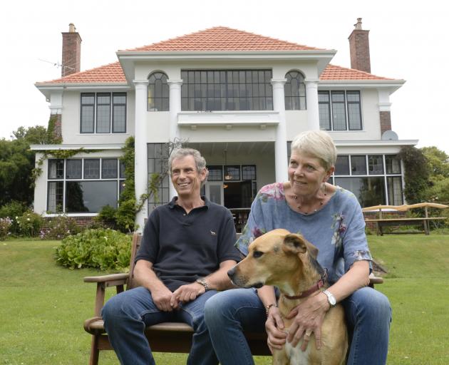 David Gwynne-Jones and Ulla Reymann, pictured with dog Monty, wanted to keep their home's...