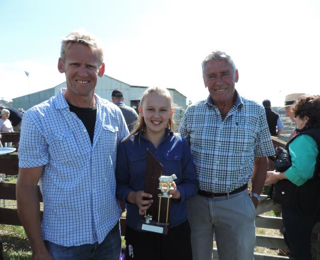 The Hawke family of Makikihi (from left) Simon, Sienna (11), and Dennis, won the all breeds ram...
