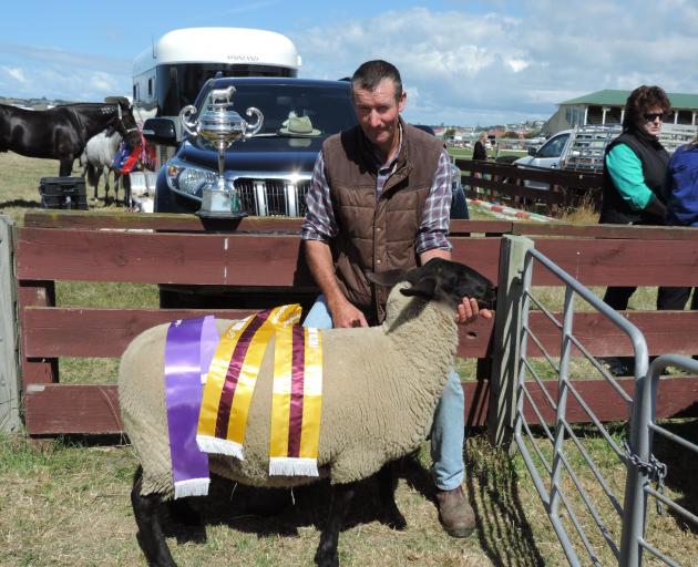 Waitaki Valley farmer Alastair Gibson likes this reserve champion fleece from Hamish and Pip Smith at Ben Dhu Station, Omarama. Photos: Sally Brooker