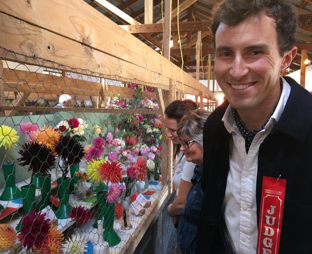 Charlie McCormick, his aunty, Catherine McCormick, and sister, Annabel Thoms, check out the cut flower competition at the Mayfield A&P Show. Photo: Toni Williams