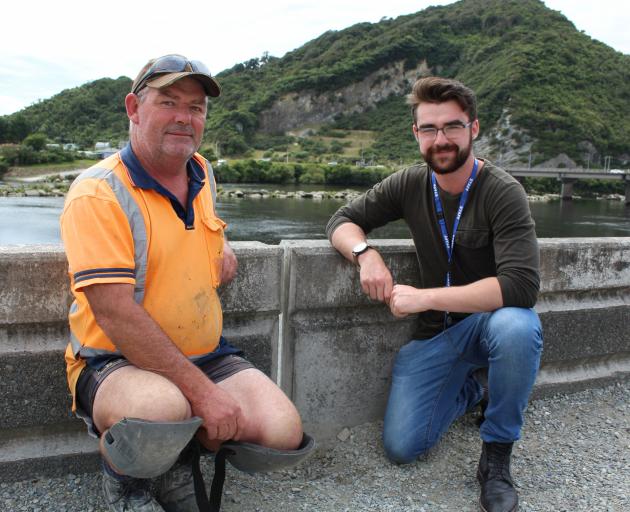 Liddells site foreman Jamie Rees with West Coast Regional Council engineering officer Jamie Bell as repairs begin on the Greymouth floodwall. Photo: Greymouth Star