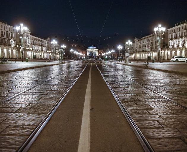 An almost deserted piazza Vittorio in Turin, Italy. Photo: Getty Images 