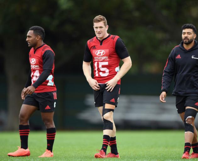 Sevu Reece and Dallas McLeod with Richie Mo'unga before going into self-isolation. Photo: Getty...