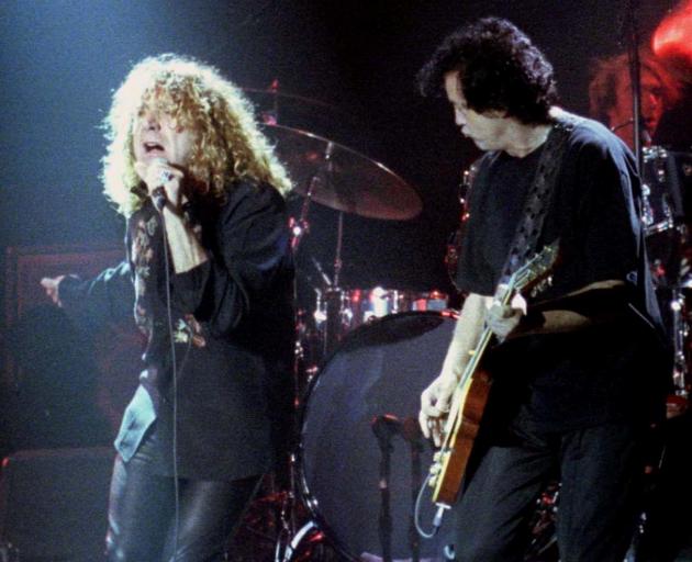 Led Zeppelin singer Robert Plant and guitarist Jimmy Page at a 1998 concert. Photo: Reuters 