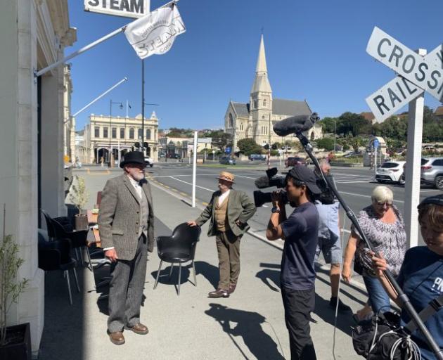 Victorian gents David Maclean and Graeme Martin are filmed outside Steam cafe. Photo: Supplied