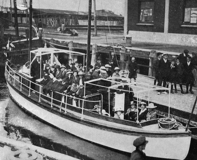 A launch load of children from orphanages leaving Dunedin wharf for the annual picnic given by...