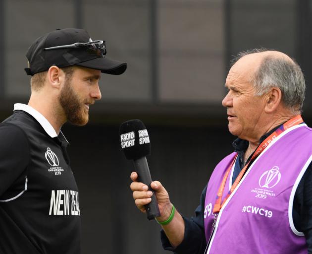 Kane Williamson is interviewed by Bryan Waddle during the Semi-Final match of the ICC Cricket...