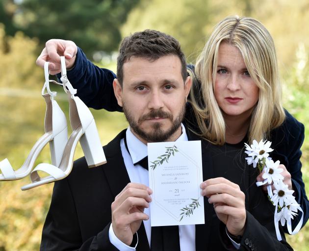 Dunedin couple Maxi Baldiano and Michaela Sainsbury have had to cancel their wedding three days...