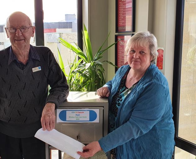 Bupa Windsor Park Care Home resident Gilbert Winwood (95) and care home manager Lynda Harding...