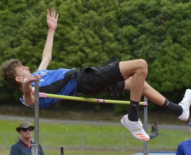 Over he goes . . . Invercargill athlete Quinn Hartley clears the bar to win the boys grade 14...