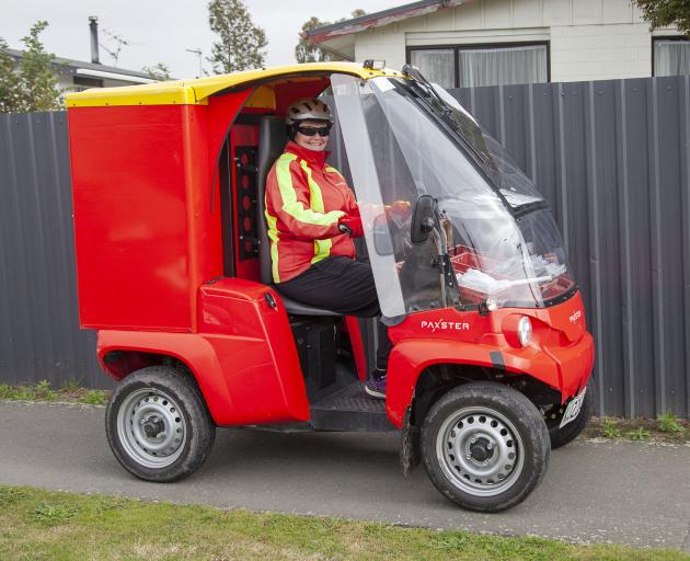 A happy postie delivering mail on Gilberthorpes Rd, Hei Hei.