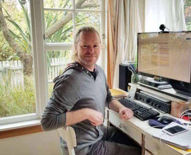 Ciaran Fox shows off his office set up. Photo: Supplied