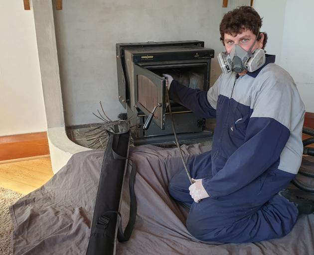 Extreme Clean Chimney Clean founder Jay McPhee out on a job this week. PHOTO: SUPPLIED