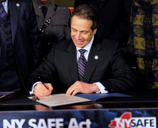 New York Governor Andrew Cuomo signs the New York Secure Ammunition and Firearms Enforcement Act...