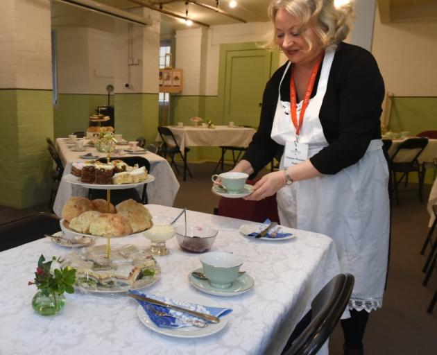 Olveston Historic Home guide Viv Houston serves an afternoon tea in the drying room. PHOTOS:...