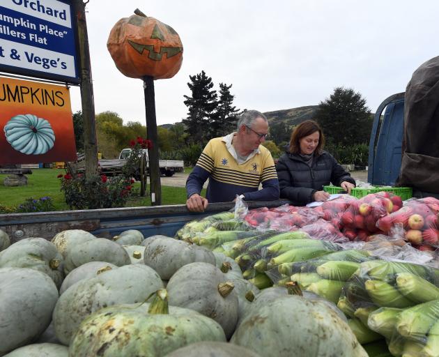 Darryl Peirce and Lynley Stuart of The Pumpkin Place, Millers Flat, check the next day’s...