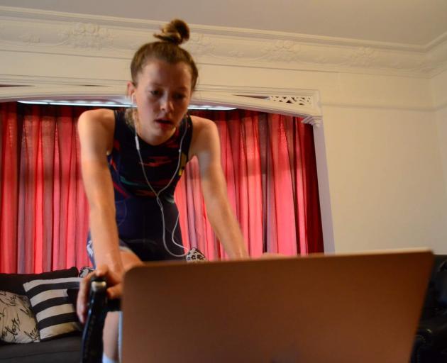 Dunedin cyclist Ella Harris trains in the comfort of her parents’ living room. PHOTO: SUPPLIED 