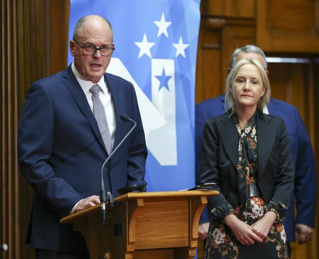 Newly elected National Party leader Todd Muller speaks to media while new deputy leader Nikki...